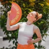 Abanico pintado "Putain de chaleur" degradado naranja