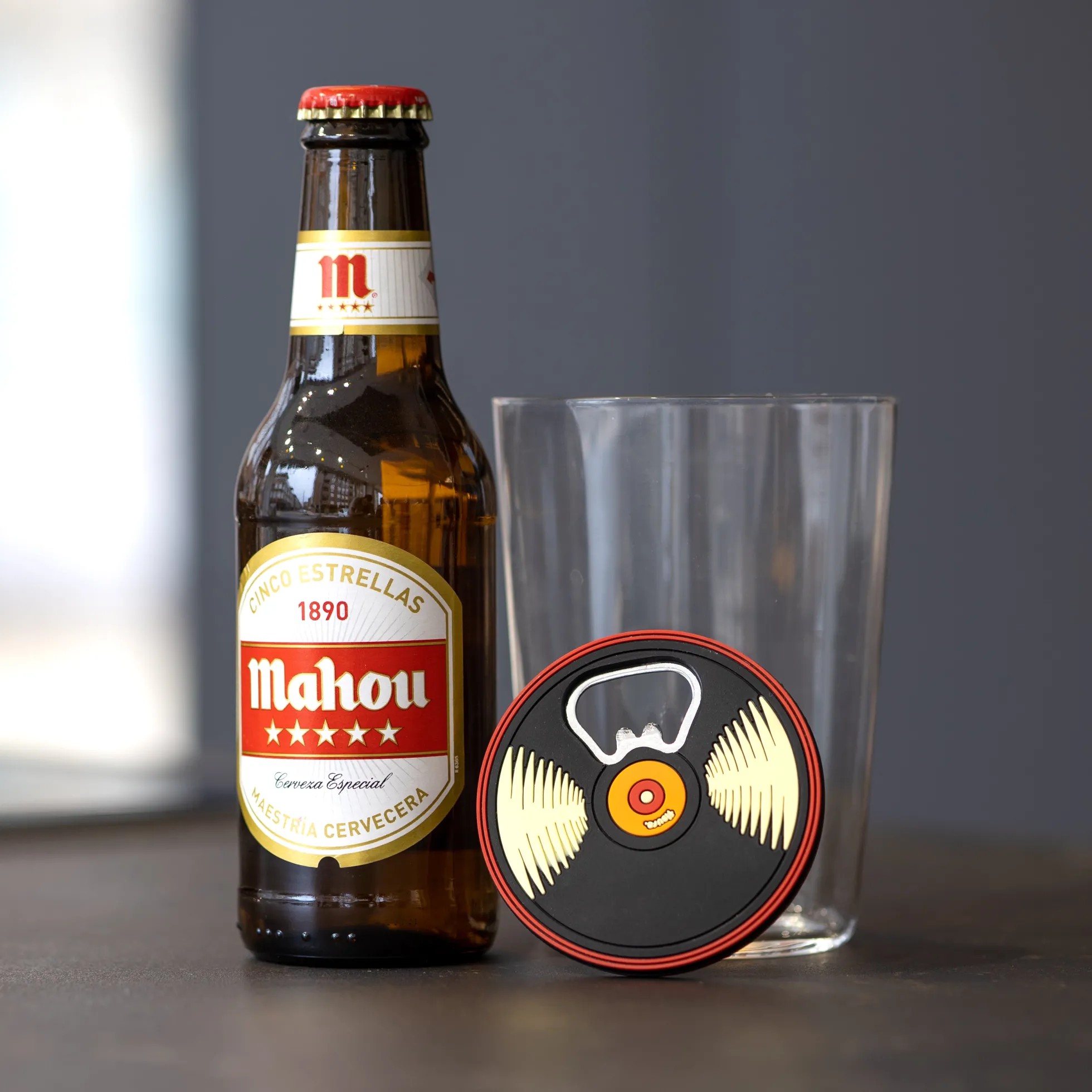 Abridor de botellas "vinilo"