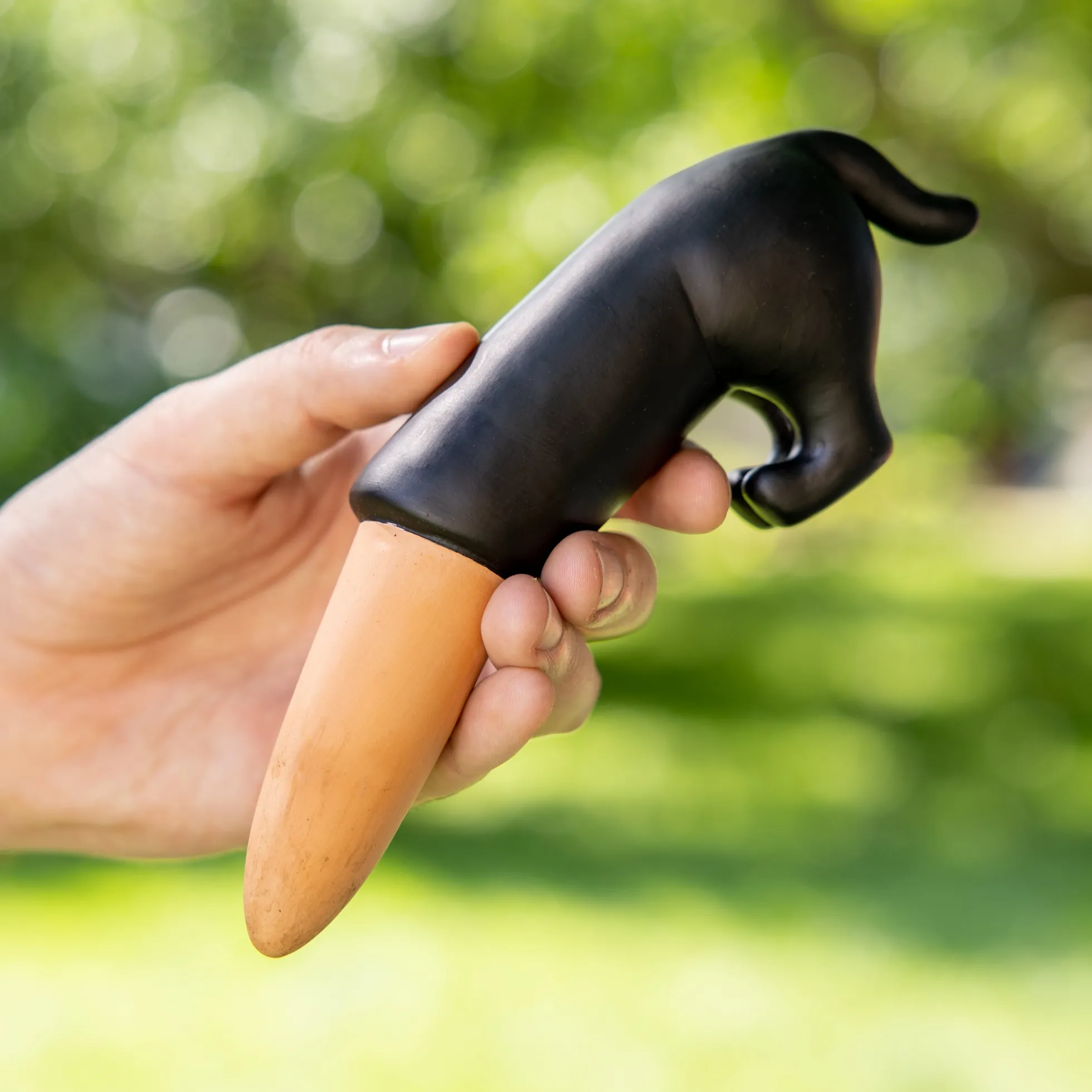 Autorriego perro negro