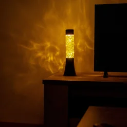 Lámpara de lava glitter de estrellas de 30 cm con base negra y líquido amarillo