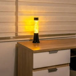 Lámpara de lava glitter de estrellas de 30 cm con base negra y líquido amarillo